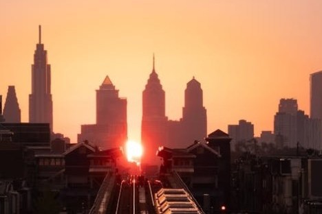 a view of a city at sunset