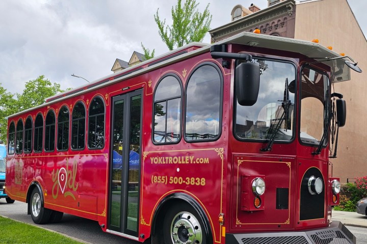 a fire truck parked in front of a bus